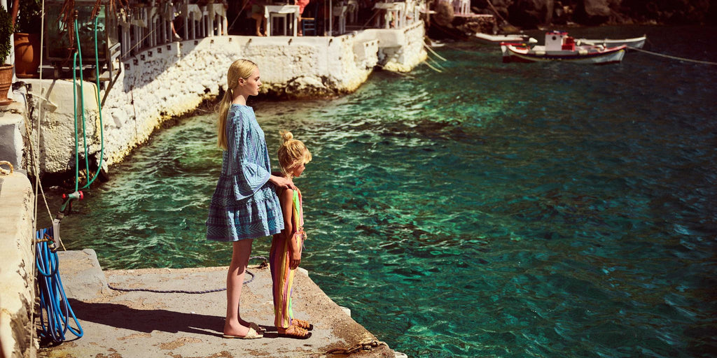 Little girl and her mum wearing matching bestseller dress, Ella from Greek resort wear brand, Devotion Twins