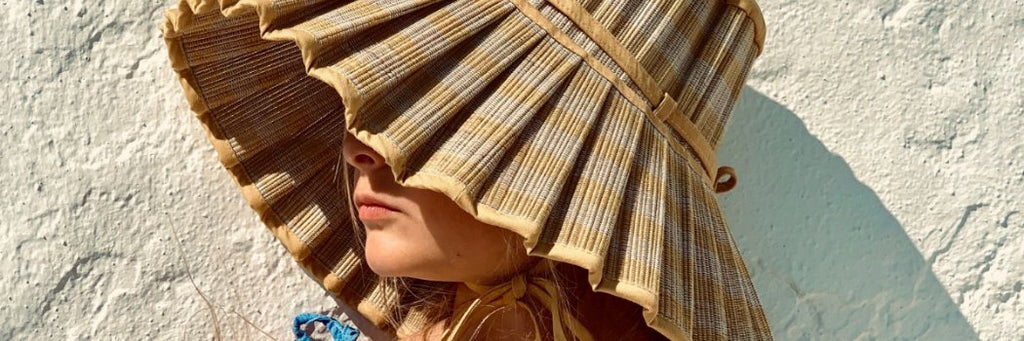 Girl wearing Lorna Murray Capri Sun Hat in Sorrento
