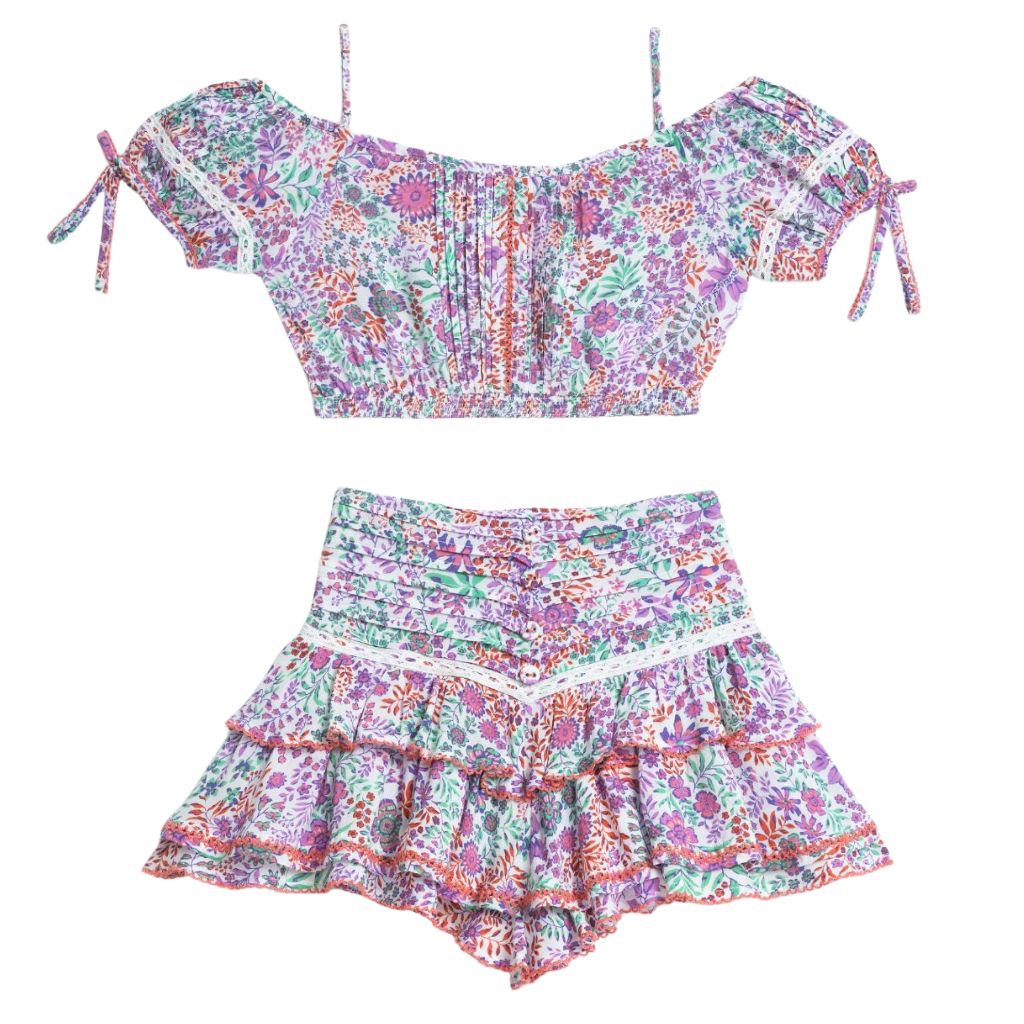 Product shot of the Bonny Kids Top and Alizee Mini Skirt in White Lavender print from Poupette St Barth