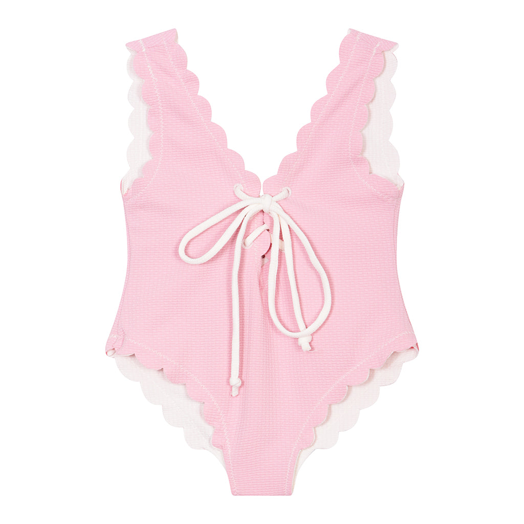 Product shot of the reverse of the Marysia Bumby Palm Springs Lace Up Maillot Swimsuit in Coconut White and Pink Bloom