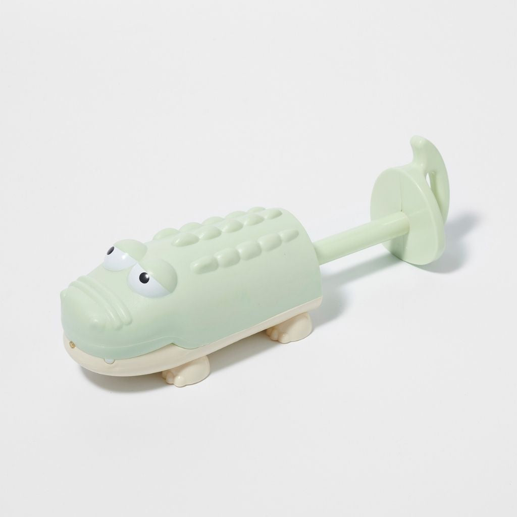 Product shot of the Sunnylife Pastel Green Crocodile Water Squirter