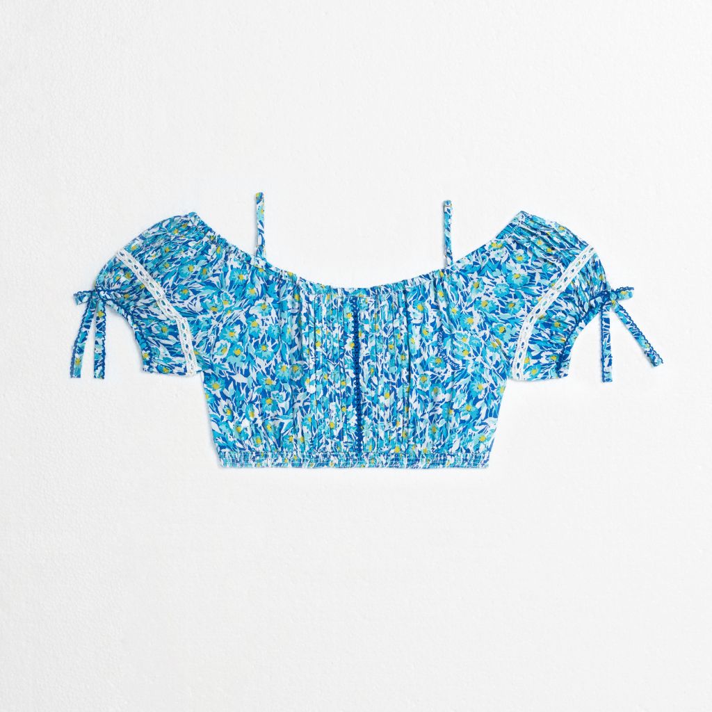 Product shot of the back of the Bonny Kids Top in Blue Ocean Flowers print from Poupette St Barth