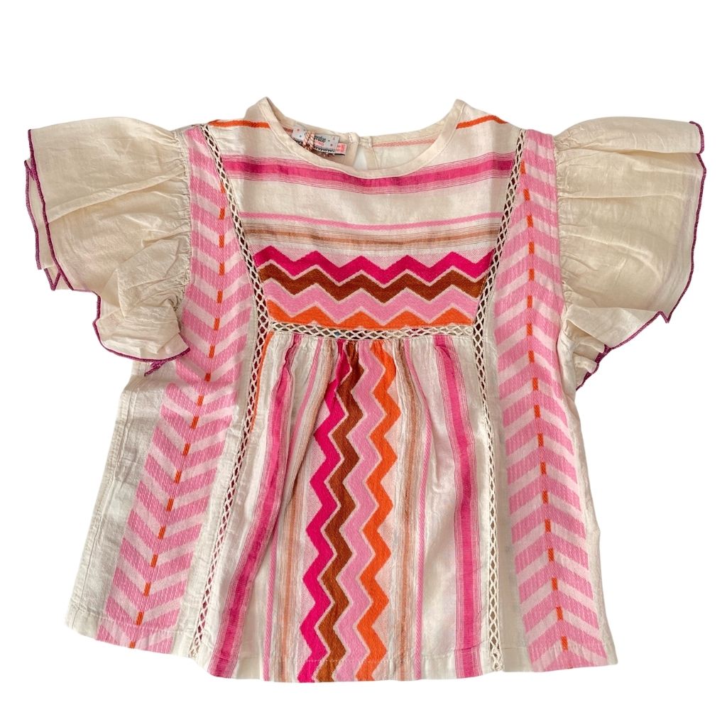 Front of the Devotion Twin Stars children's Adela blouse top in shades pink, orange and brown