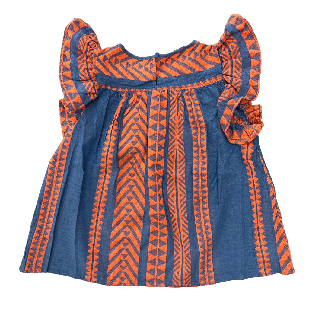 Product shot of the back of the Devotion Twins Stars Violeta Blouse Top in Orange and Blue
