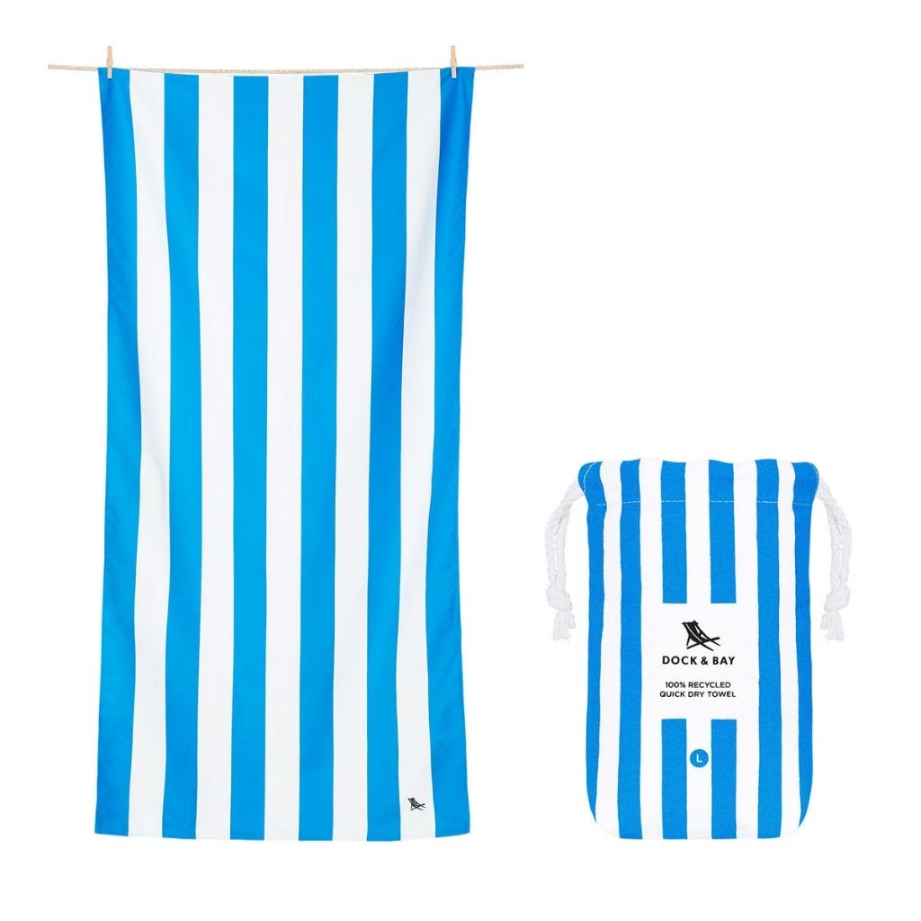 Product shot of Dock and Bay Signature striped cabana towel and pouch in Bondi blue