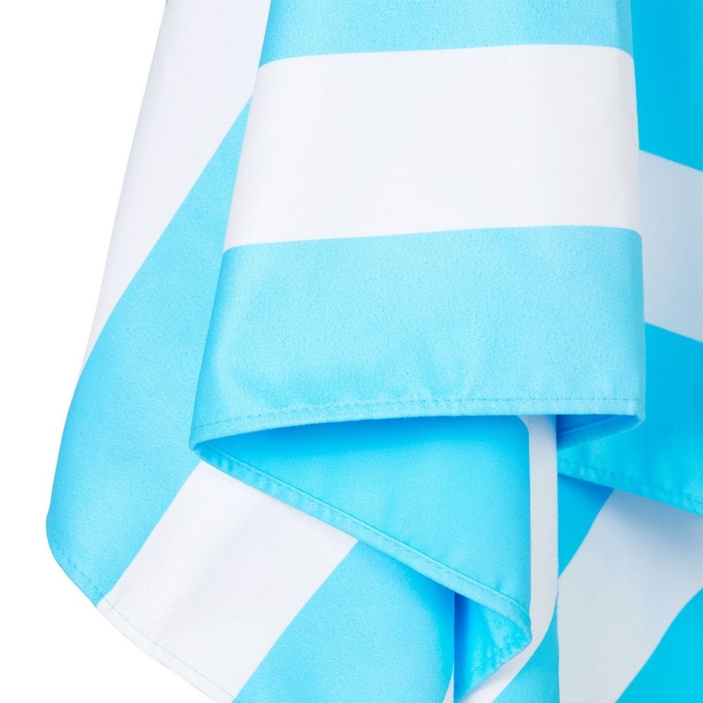 Close up of Dock and Bay Signature striped cabana towel in Tulum Blue