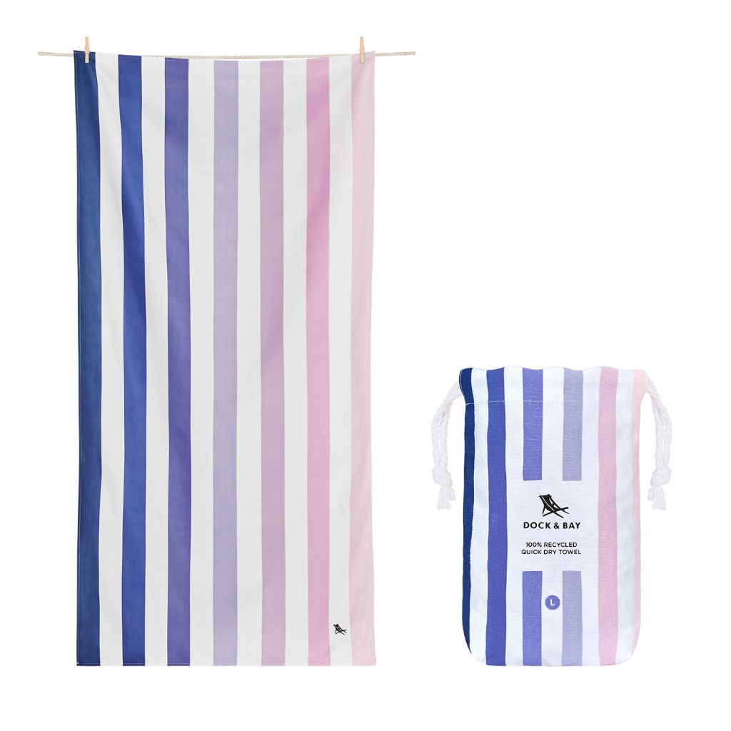Product shot of Dock and Bay Striped Summer Beach towel and pouch in Dusk to Dawn