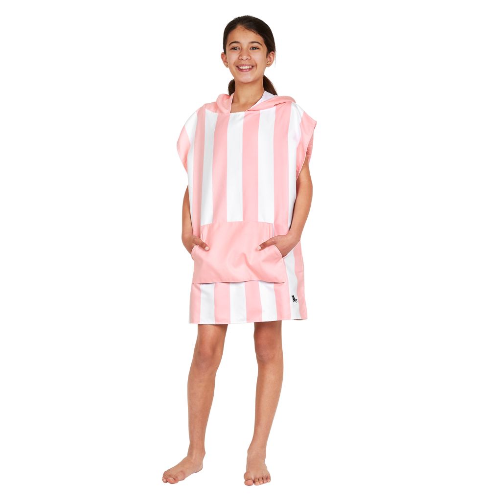 Little girl wearing Dock and Bay kids hooded poncho in Malibu Pink
