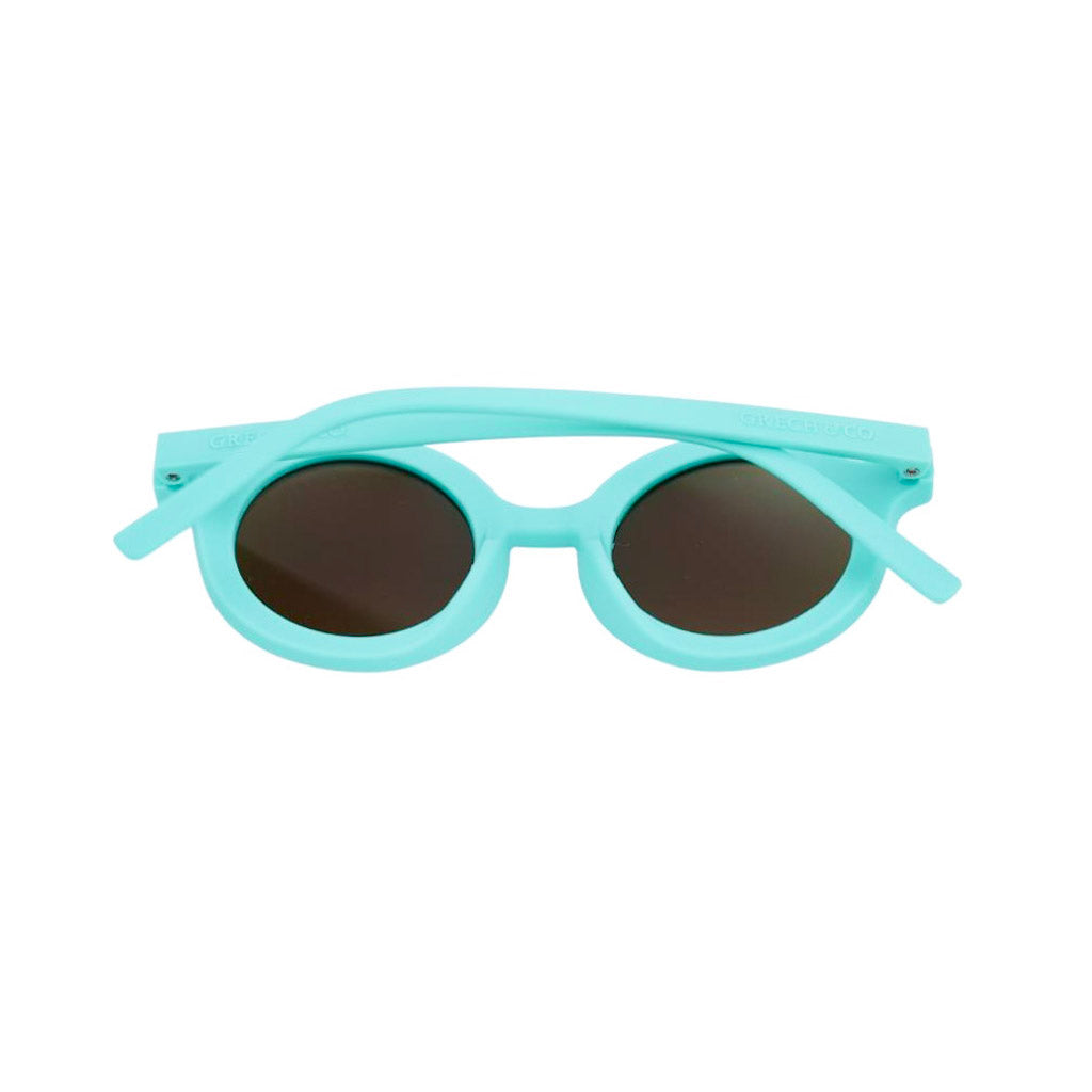 Back shot of Grech and Co sustainable round sunglasses in Aqua 