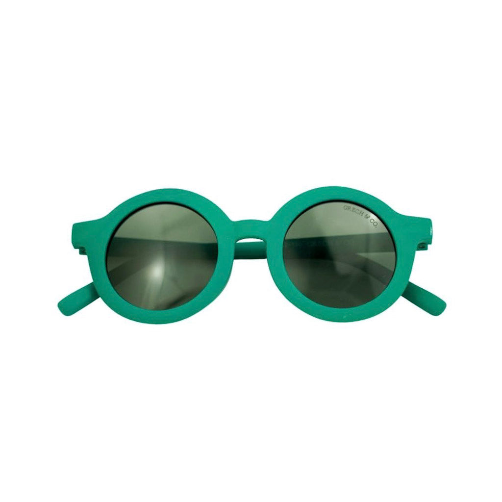 Product shot of Grech and Co sustainable round sunglasses in Emerald