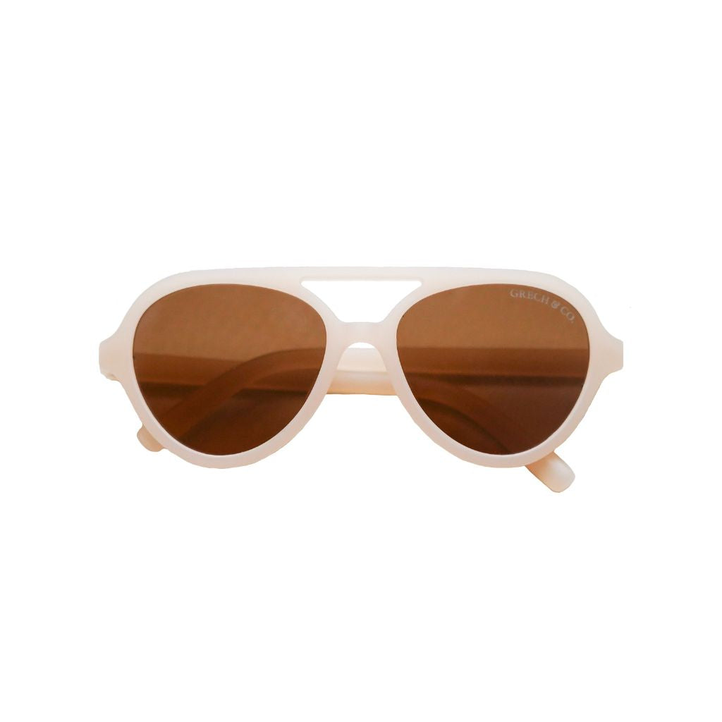 Product shot of Grech and Co Aviator Polarised Sunglasses for babies, toddlers and children in creamy white