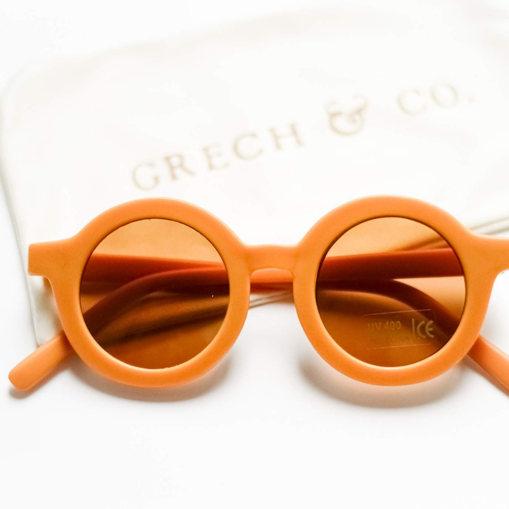 Grech & Co children's sunglasses in golden orange with uv400 protection