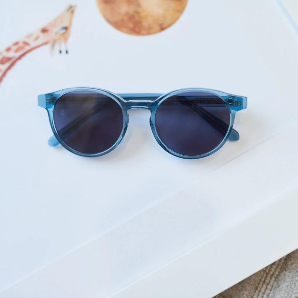 Product shot of the Julo 2 blue round sunglasses for 3-6 year olds from Maison Juli
