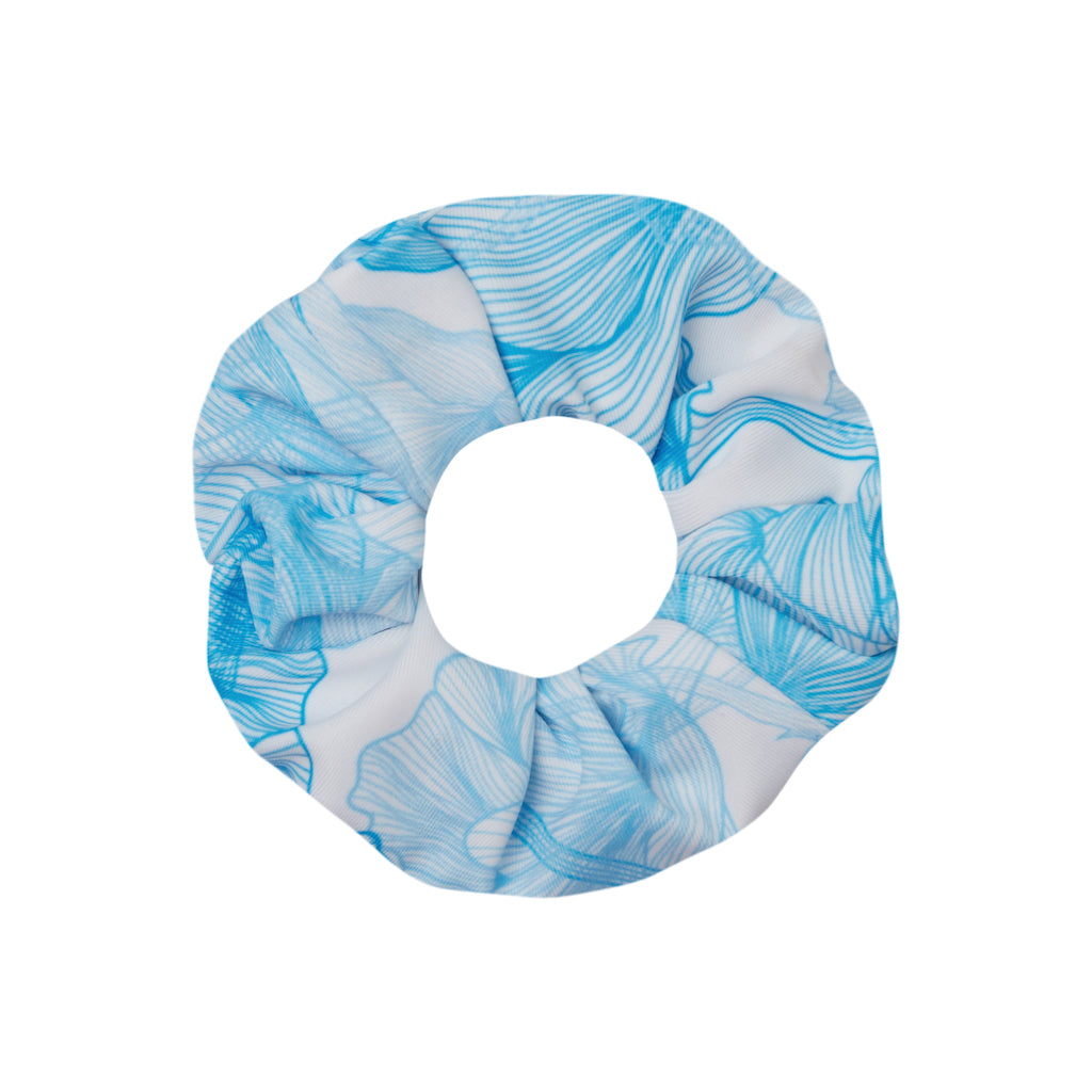 Product shot of the Marie Raxevsky hair scrunchy in blue flower print