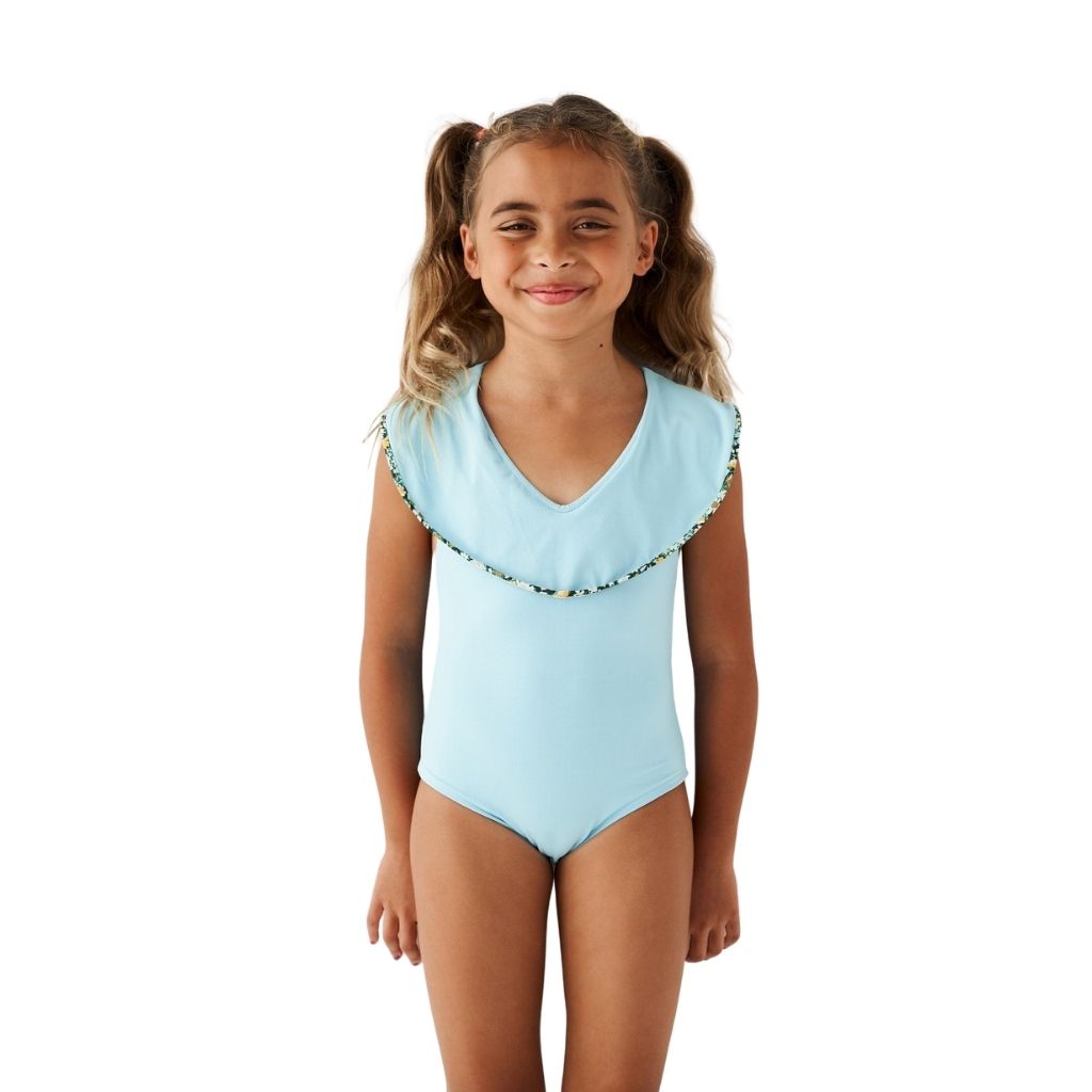 Little girl front view wearing Marysia Bumby Piana swimsuit in Horizon blue