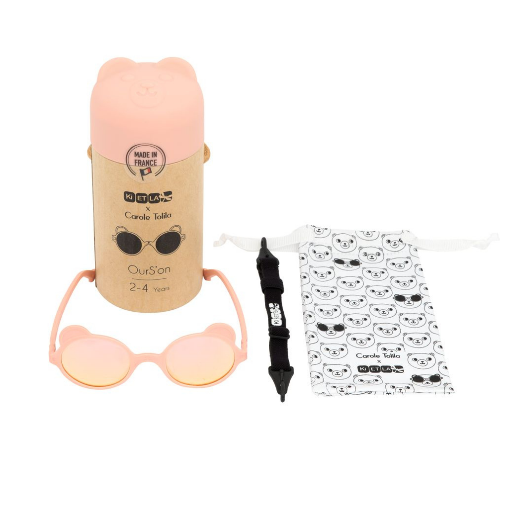 Contents of Ki et La Ourson Teddy Bear sunglasses for children from 1 - 4 years in peach including box, sunglasses, adjustable strap and cloth pouch