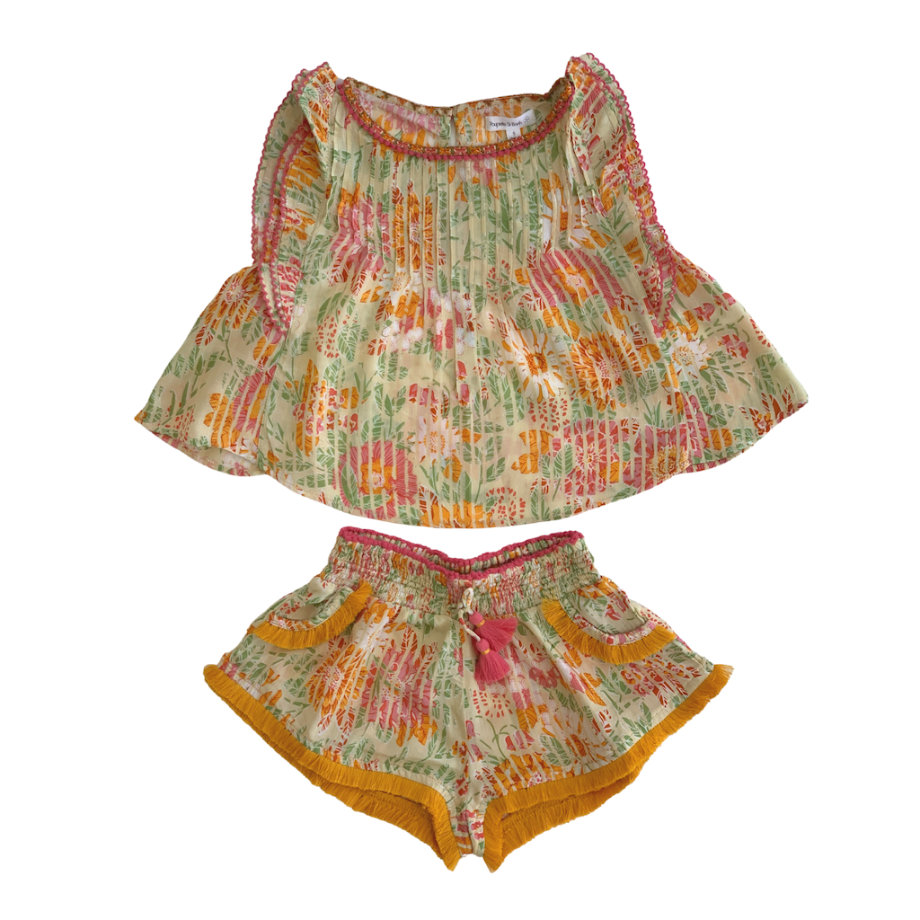 Poupette St Barth Amber Pleated Top in Yellow Marigold with matching boxing shorts from the Poupette St Barth Childrenswear line