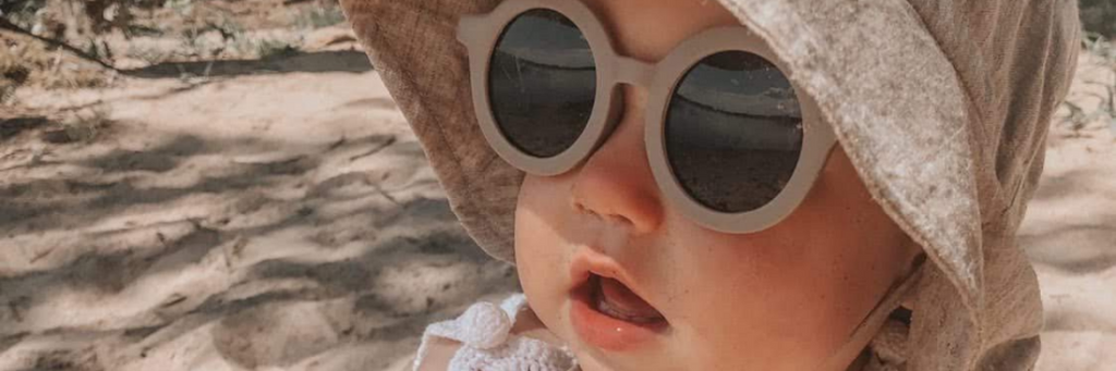 Baby wearing Grech & Co sunglasses