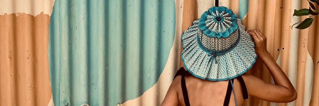 Girl wearing a Lorna Murray Apparel Capri Sun Hat
