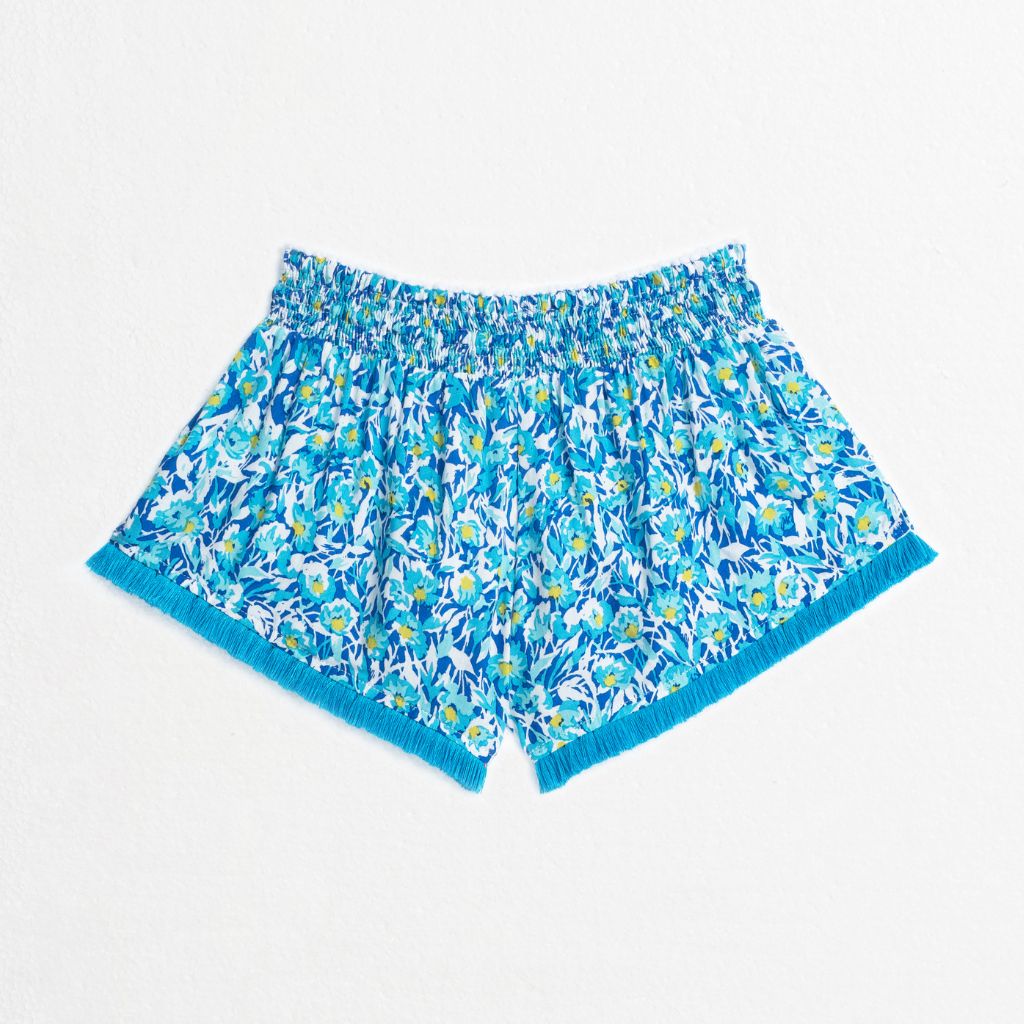 Product shot of the back of the Lulu Boxer Shorts from Poupette St Barth in Blue Ocean Flowers print