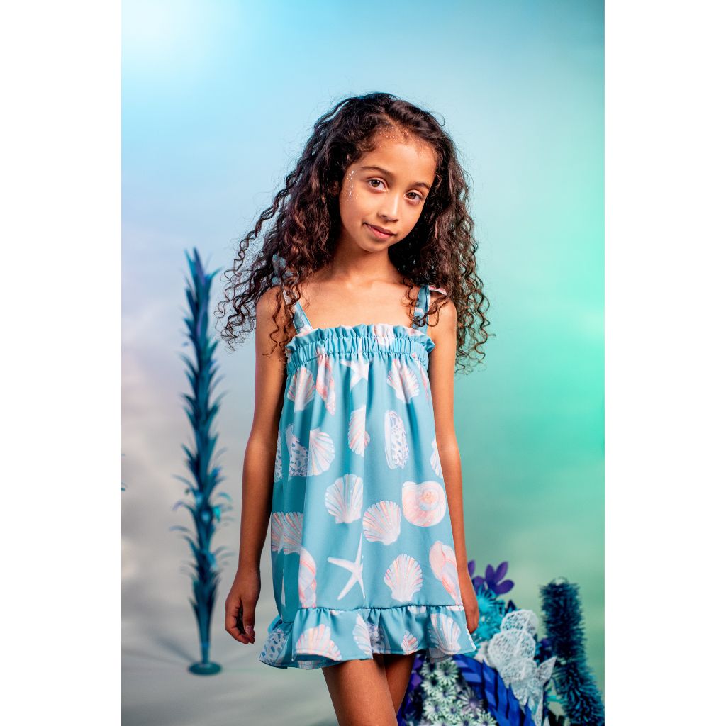 Little girl wearing the Pepita & Me Conchas Verde Elisa Dress  for girls from the Tornasol Collection
