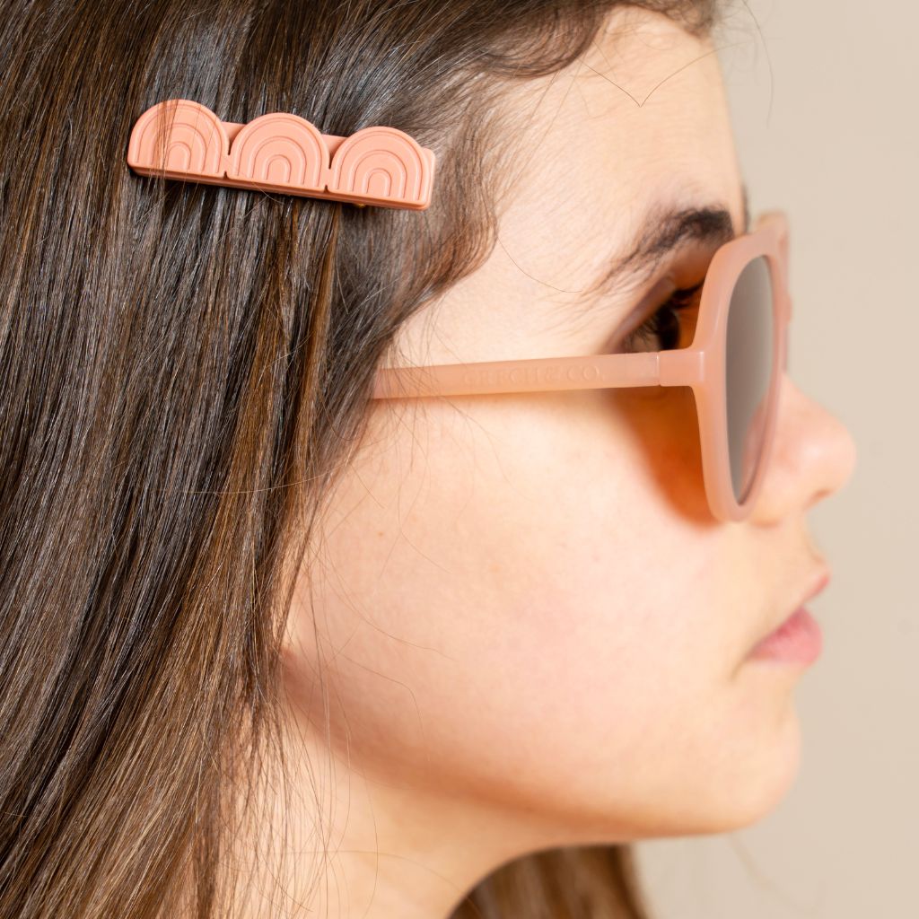 Little girl wearing Grech and Co Aviator Sunglasses for baby, toddler and juniors in coral rouge