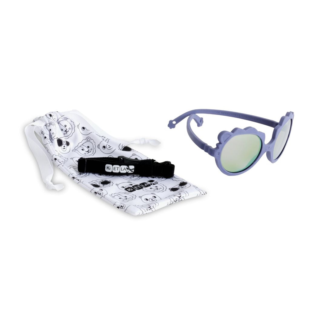 Product shot of the dust bag and strap for the Ki et La Lion Baby Sunglasses in lilac