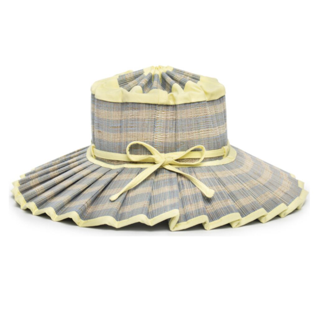 Product shot of a side view of the Malibu Capri Children's Sun Hat from Lorna Murray in lemon yellow