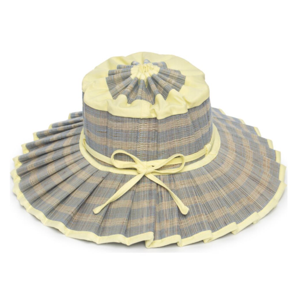 Product shot of a tilted side view of the Malibu Capri Children's Sun Hat from Lorna Murray in lemon yellow