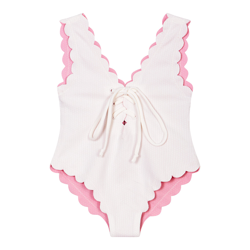 Product shot of the front of the Marysia Bumby Palm Springs Lace Up Maillot Swimsuit in Coconut White and Pink Bloom