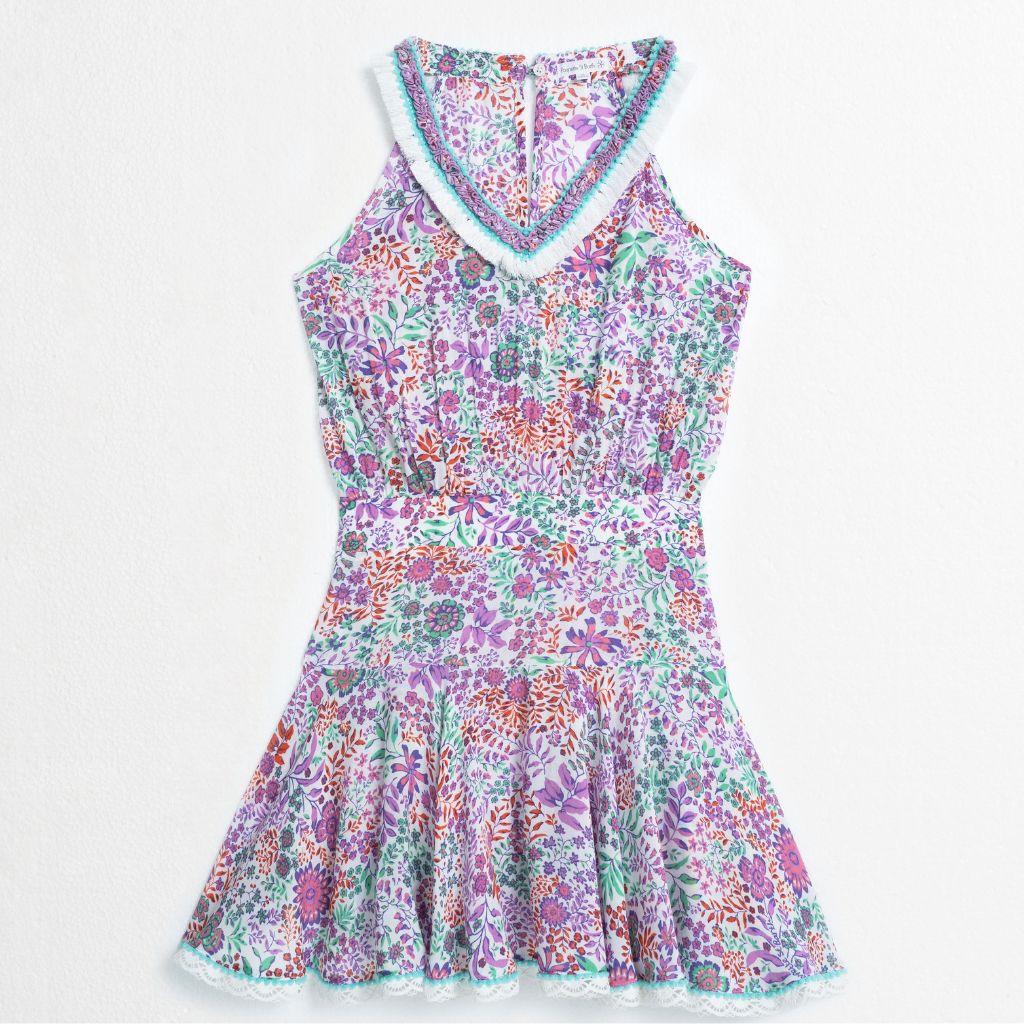 Product shot of the front of the Agathe Mini Dress from Poupette St Barth Kids in White Lavender Nature print 