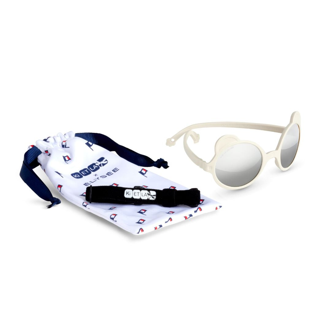 Product shot of the dust bag and strap for the Ki et La Ours'on Elysee White baby sunglasses
