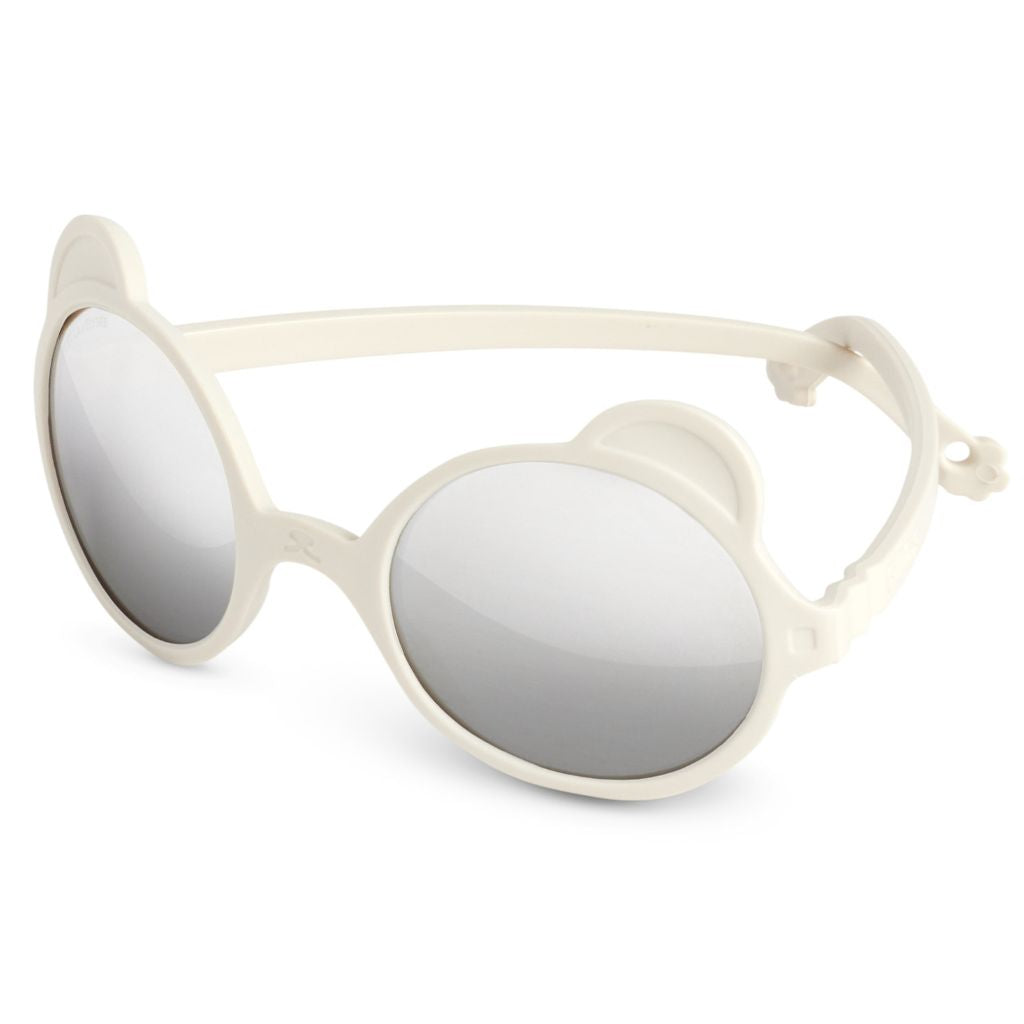 Close up shot of the Ki et La Ours'on Elysee White baby sunglasses