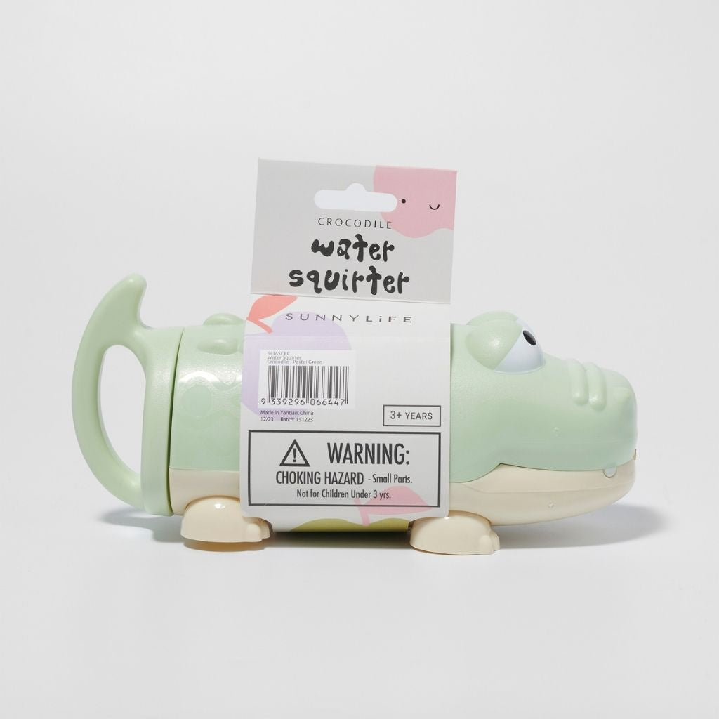 Packaging shot of the Sunnylife Pastel Green Crocodile Water Squirter