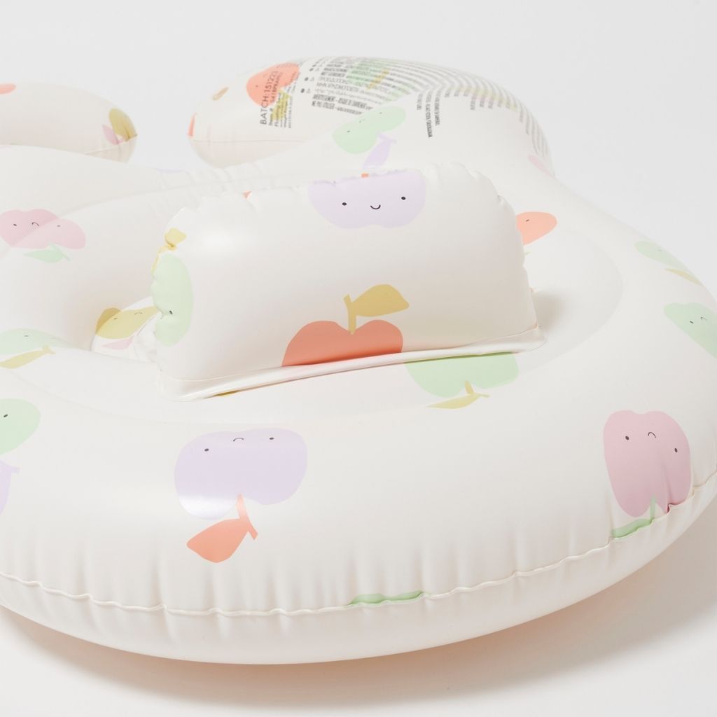 Close up of the cushion on the Sunnylife Float Together Baby Seat in Apple Sorbet