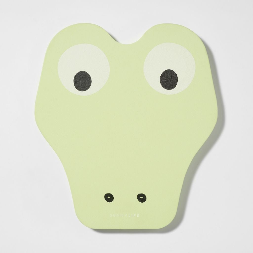 Product shot of the Sunnylife Kids Kickboard Float in the Cookie the Croc shape