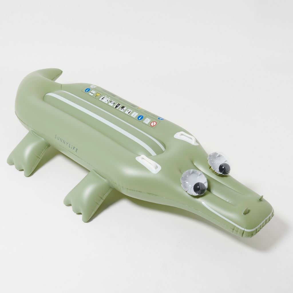 Product shot of the Sunnylife Cookie the Croc lie-on inflatable float in khaki green