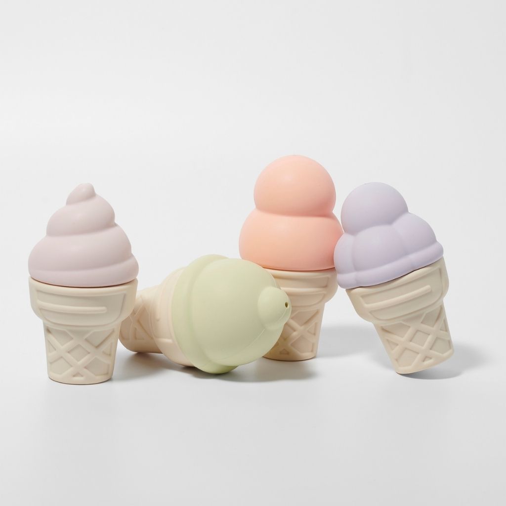 Product shot of the Sunnylife Ice Cream Splash Toys in Apple Sorbet all lined up