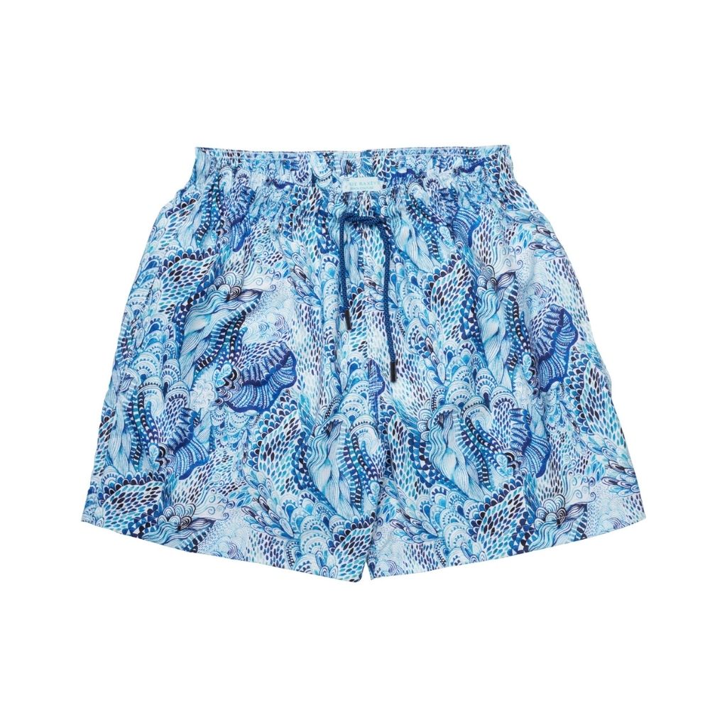 Product shot of the front of the Marie Raxevsky boys swim shorts in Wave print