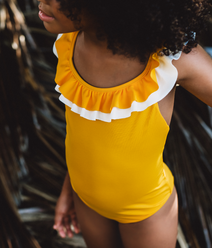 Little girl wearing Folpetto Penelope swimsuit in Mango