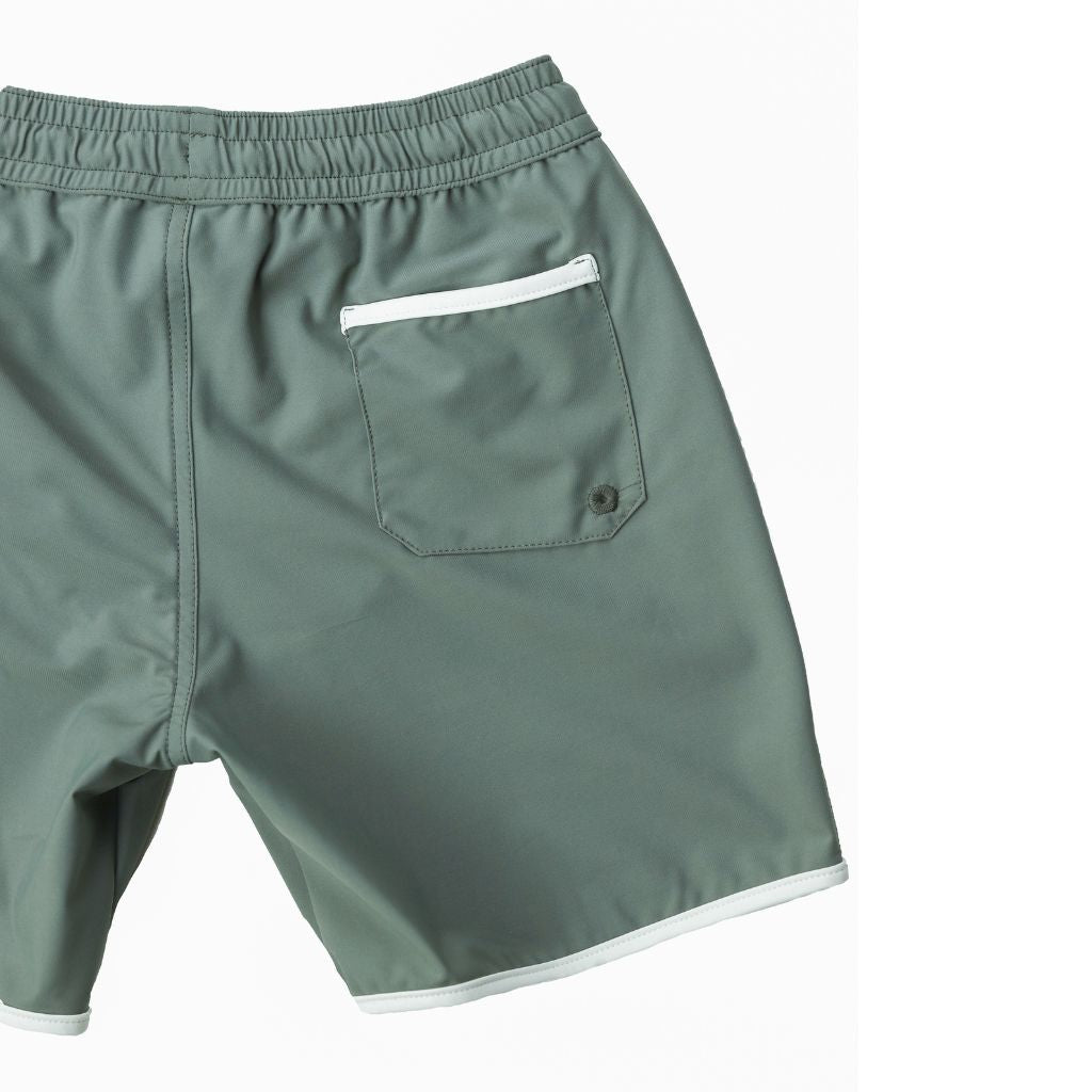 Product shot of the details on the Folpetto Tommaso swim shorts in sage green and ivory