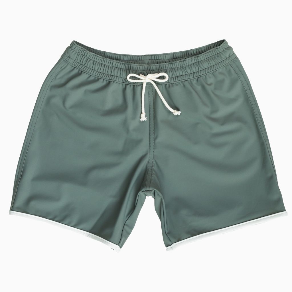 Product shot of the front of the Folpetto Tommaso swim shorts in sage green and ivory