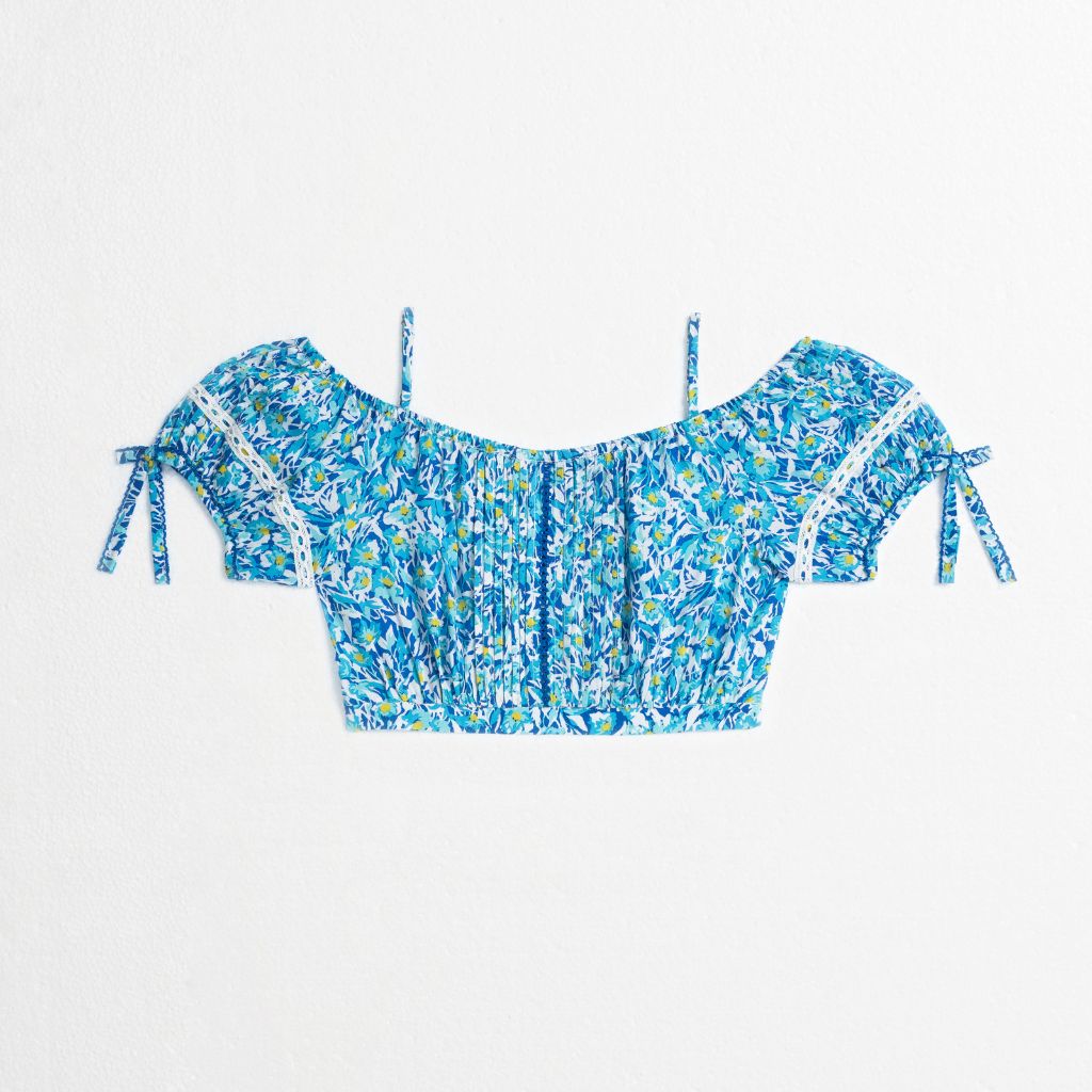 Product shot of the front of the Bonny Kids Top in Blue Ocean Flowers print from Poupette St Barth