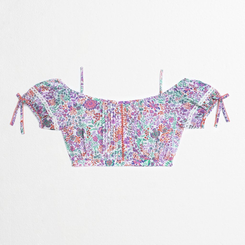 Product shot of the back of the Bonny Kids Top in White Lavender print from Poupette St Barth