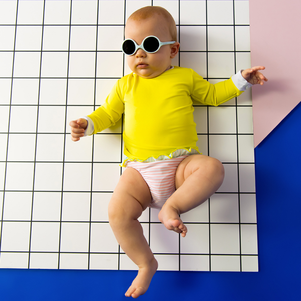 Baby wearing Ki et La Baby Diabola Sunglasses in Sky Blue for 0 - 1 year olds