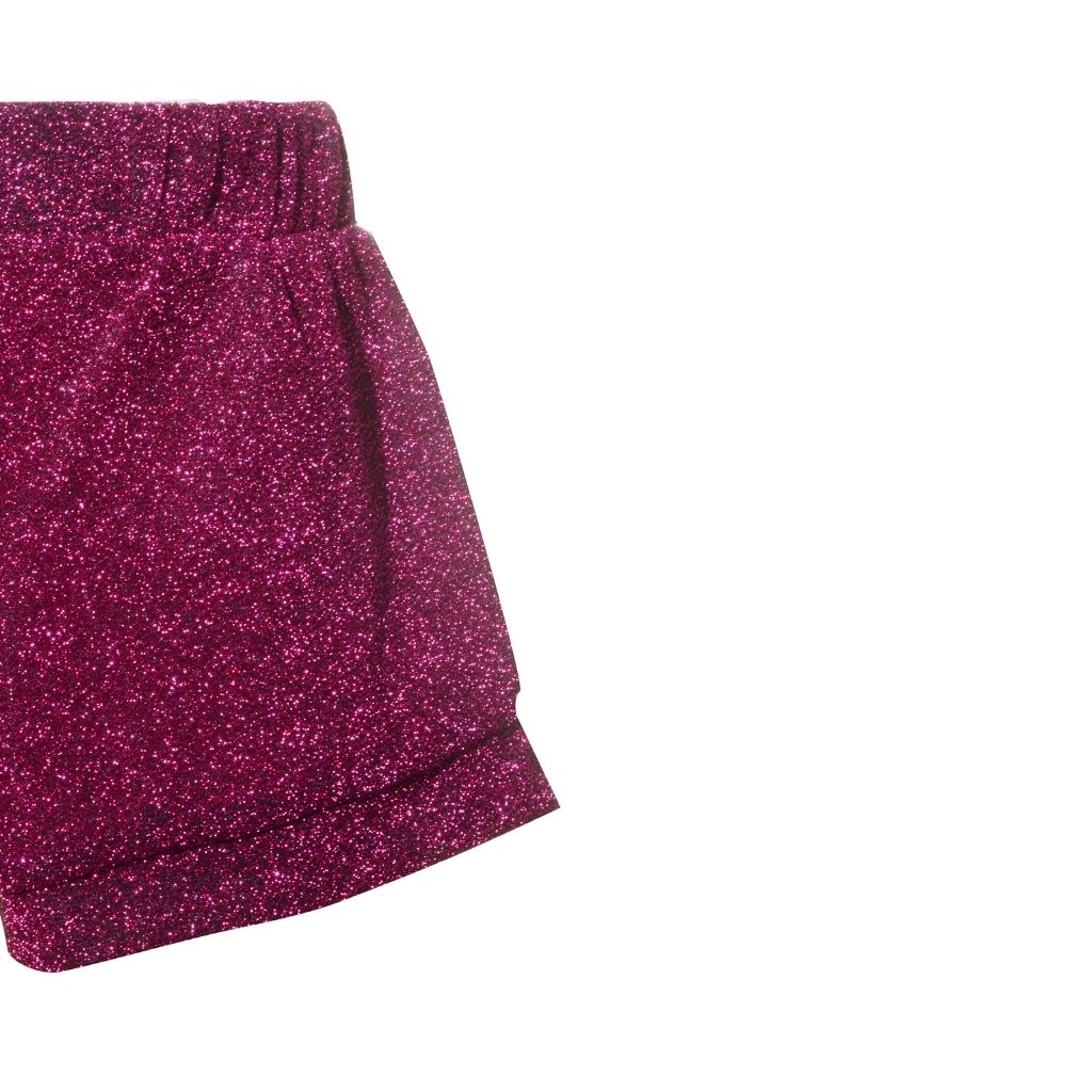 Close up of Oseree Kids Osemini Lumiere girls metallic shorts in dark fuchsia pink