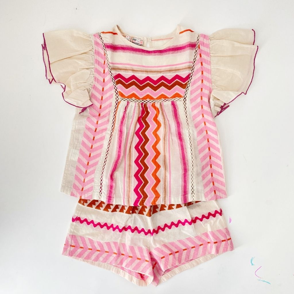 Devotion Twin Stars children's Adela blouse top in shades pink, orange and brown together with the Nani shorts to create a beautiful two piece