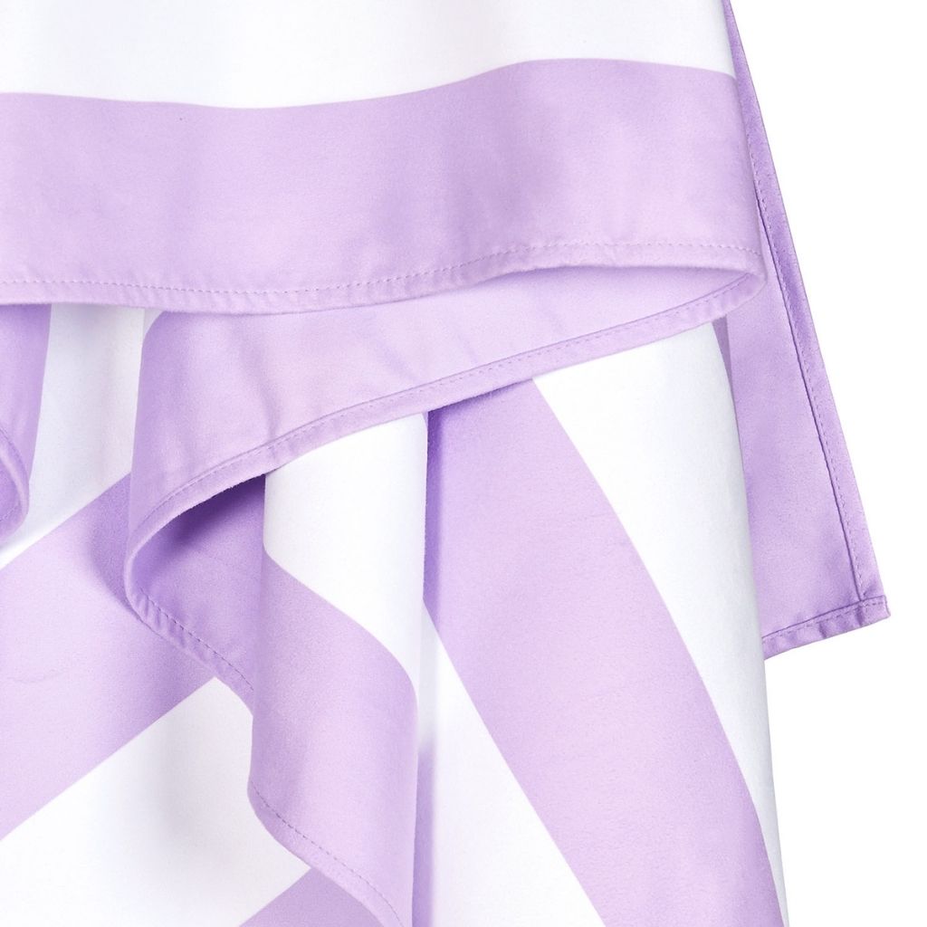 Close up of Dock and Bay Signature striped cabana towel in Lombok Lilac
