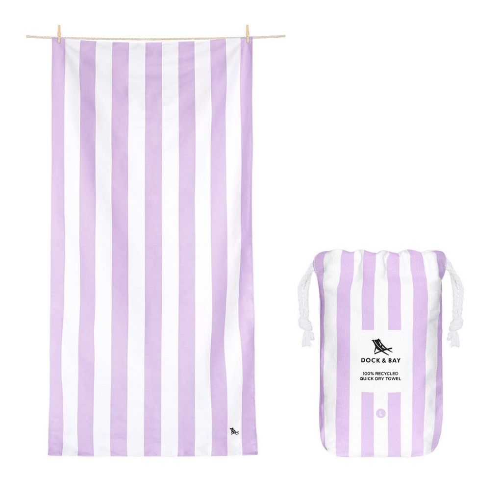 Product shot of Dock and Bay Signature striped cabana towel and pouch in Lombok Lilac