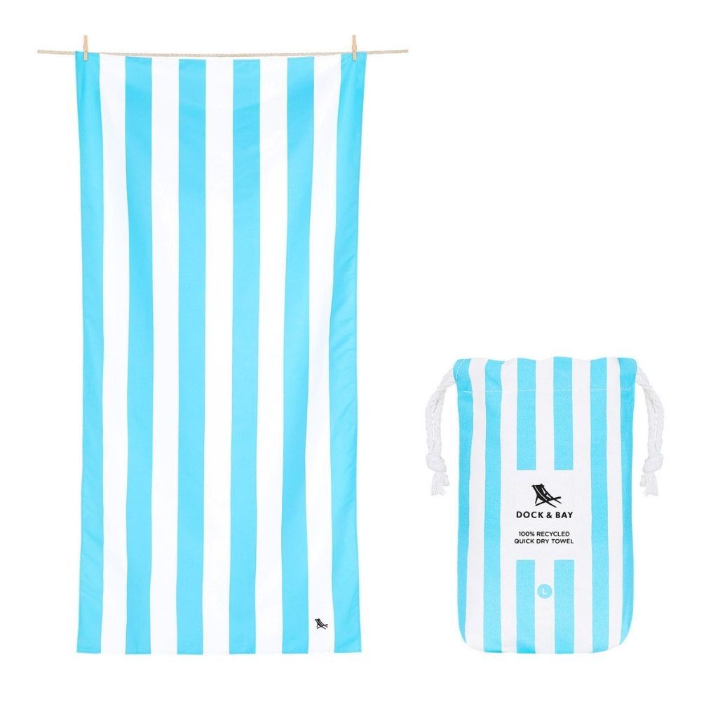 Product shot of Dock and Bay Signature striped cabana towel and pouch in Tulum Blue